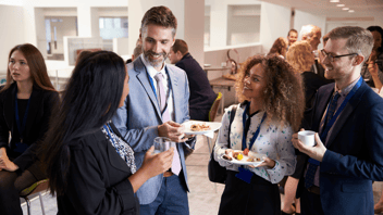 Group of people networking at a conference