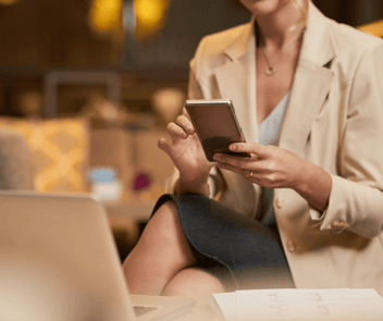 Lady checking messages on smartphone